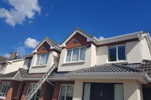 Fitting New Gutters on a House